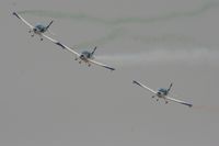  - Texan Team, three disabed pilots flying close formation in these ultra lights - taken at the Royal International Air Tattoo 2010 - by Steve Staunton