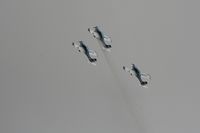  - Texan Team, three disabed pilots flying close formation in these ultra lights - taken at the Royal International Air Tattoo 2010 - by Steve Staunton