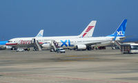  - holiday planes on their parking position at Teneriffe Sur - by Thomas Ranner