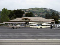  - A pair of WACO Classic YMF-F5Cs parked on the transient line on First Sunday Aviation Museum of Santa Paula Open House Fly-In. N196RB & N110AS. - by Doug Robertson