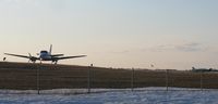 - Bemidji Aviation Beech Queen Air taxiing for its evening departure to MSP. - by Kreg Anderson