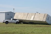  - Storm damage from the 3/30/11 microburst/tornado.  Trailer blown down onto a Ford F250 - by Florida Metal
