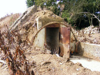  - WWII air raid shelter at the rear of one of the E pens at North Weald Airfield - by Chris Hall