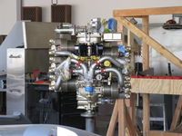  - Aviation F/X. Assorted Experimental aircraft, In build. New engine on vertical engine stand.  - by Doug Robertson