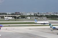  - Mix of old and new - Jet Blue A320, DC-3 and turbo Beech 18 waiting to depart - by Florida Metal