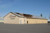  - Damaged hangar from a storm this summer at the Olivia Municipal Airport in Olivia, MN. - by Kreg Anderson