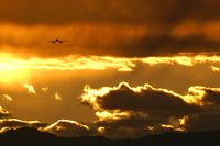  - Landing RWY7L with awesome sunset. - by Brad Campbell