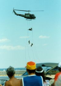 - Rhode Island National Guard Soldiers rappelling from a Bell UH-1 Iroquois Helicopter at Quonset State Airport, North Kingstown, RI - circa 1980's - by scotch-canadian