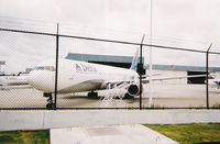  - Delta maintenance scanned from an old film shot.  Hurricane Frances was approaching the ATL - by Florida Metal