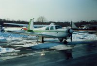  - Mooney Aircraft parked at Dutchess County Airport, Poughkeepsie, NY - circa 1980's - by scotch-canadian