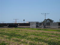  - Recent installation of Rwy 25 alignment approach lights-off and on-airport - by Doug Robertson