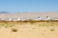  - A line of old Gulfstream aircraft grace California City Municipal Airport - by Terry Fletcher