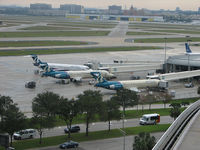  - AirTran aircraft at remote terminal B at Tampa Int'l Airport - by Ron Coates