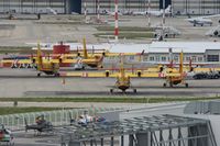  - Canadair CL-415 Parking area. In the foreground Eurocopter workshops, Marseille-Provence Airport (LFML-MRS) - by Yves-Q