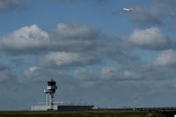  - View from fence at southern rwy over twys Echo 7 and Echo 8 to Tower and AN 124 Hangar at apron 3 while outbound traffic has left via rwy 26R.... - by Holger Zengler