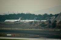  - Three stored MD-82's taken from the Fly Inn Shopping Mall. - by Carl Byrne (Mervbhx)