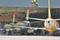  - B735s being prepared for ill-fated Solyom Hungarian Airways whilst Precision Air looks on. - by John Coates
