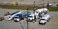  - Fuel trucks at DFW - by Ronald Barker