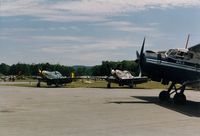  - A pair of North American P51-D Mustangs and an 1970 Antonov AN-2 at the 1993 Sussex Air Show, Sussex, NJ  - by scotch-canadian