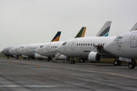  - A line up of six Boeing 737s parked on the former runway 35/17. Access here is not normally possible but recent flooding meant that cars were escorted across to reach the NE side of the airport. - by Howard J Curtis