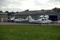  - Two Cirrus SR22s at Staverton Gloucestershire airport, England. - by Henk van Capelle