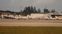  - More crowded ramps at Landmark Aviation FBO for the art show  - by Florida Metal