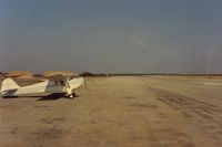  - 39932 at Poso Kern airport in 1990. Not much there but nice runway. Nice place when the drag strip next door is active - I guess? - by S B J