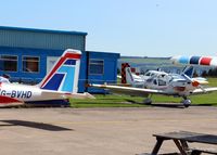  - Tayside Aviation maintenance hangar apron and Club rest area at Dundee Riverside EGPN - by Clive Pattle