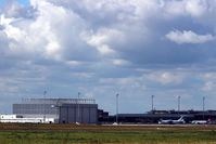  - Maintenance hangar for VD-An 124 and apron 3 with Il 76 and a VIA Air A 320. In the back airport main building and old tower. - by Holger Zengler