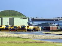  - Hangars on east side of airfield close to Rwy 23 threshold - note Tornado GR.4 in amongst stored snow ploughs - by Clive Pattle