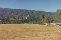  - Right down the runway to the north and several visiting aircraft which included a Cessna 310. This 310 pilot put on a little airshow which was very impressive to say the least! Notice pickup crossing runway so be prepared when landing for this possibility - by S B J