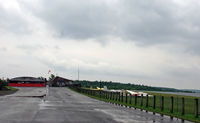  - Harris Hill has long been one of the premier airports for sailplanes.  This view shows the hangar, office, apron, and field. - by Daniel L. Berek