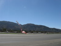  - Banner tow drop on 22L. - by Doug Robertson