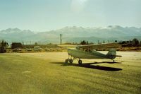  @ Bryant Field Airport - 78E at Bridgeport,Ca with the Walker River Lodge seen in the distance.Nice place to stay and its neat to look out and see your plane. Notice the six vehicles that pilots leave so they will have transportation when they fly in.Nice! - by S B J