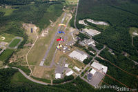  - Skydivers over Turners Falls, MA. - by Dave G