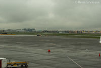  - View to southeast of south runway from domestic terminal. General activities. - by Remi Farvacque