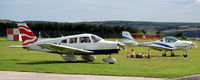  - GA park at Dundee EGPN busy with Tayside Aviation aircraft. - by Clive Pattle