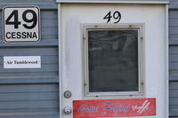 - 49 CESSNA TAXI hangar entry door - by Doug Robertson
