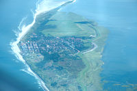  - Wangerooge, a German island, seen looking towards the east. Wangerooge airport, behind the village, takes quite a large part of the inhabitable area of the island. - by Van Propeller