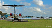  - View of a busy apron at Dundee EGPN for the Annual Dunhill Golf Championships, held at nearby St Andrews. - by Clive Pattle