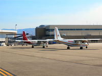  - Two Islanders parked on back country ramp. - by Gerald Howard