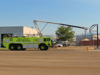  - BOI ARFF unit #10 practicing with water/foam spray nozzle. - by Gerald Howard
