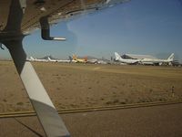  - Image taken through perspex window of aircraft whilst overflying / taxying around  - by Keith Sowter