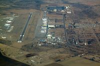  - Image taken through perspex window of aircraft whilst overflying / taxying around  - by Keith Sowter