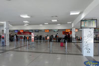  - Half an hour earlier, the check-in area was absolutely packed, with massive queues... - by Micha Lueck