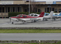  - Line-up of locally-based Cirrus SR20 + SR22 aircraft @ San Carlos Airport, CA (viewed facing east)  - by Steve Nation