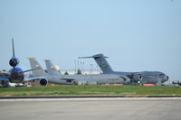  - C-17A, KC-135Rs and a FedEx L-1011 ready to fly out in support of the 190th Fighter Sq., Idaho ANG deployment to the Mid East. - by Gerald Howard