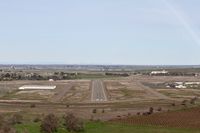  - On final into Oroville Municipal Airport with waters from the nearby Lake surrounding the airport after the dam incident. - by Chris Leipelt