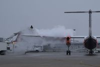  - De ice in progress on the Alaska/Horizon ramp. - by Gerald Howard