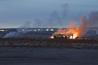  - Early morning burning of piles of tumbleweeds that collect on the airport. When the wind blows they become a FOD hazard. - by Gerald Howard